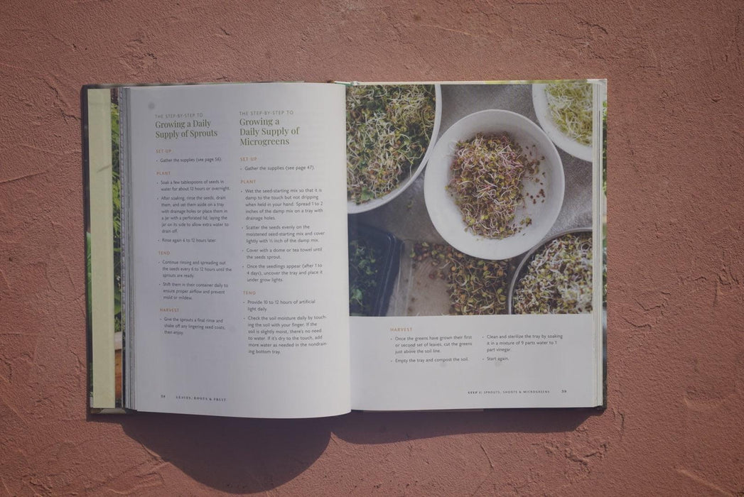 Open book: 'Growing Sprouts' & 'Growing Microgreens' guides. Bowls of fresh, vibrant sprouts and microgreens shown.