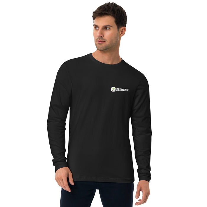 Man in black long-sleeve shirt with Seedtime logo. Casual men's apparel, comfortable crew neck tee.