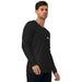 Black long-sleeve shirt with Seedtime logo on male model. Men's casual apparel, long sleeve top.