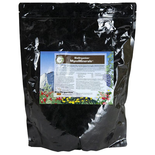 Black BioOrganics MycoMinerals soil amendment bag. Organic plant food for healthy gardens, featuring mountain & plant design.
