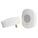 White ribbed plug-in ultrasonic pest repeller and matching wireless speaker.