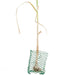 Garlic bulb planted in a green critter guard, with a long stalk and drying leaves on white.