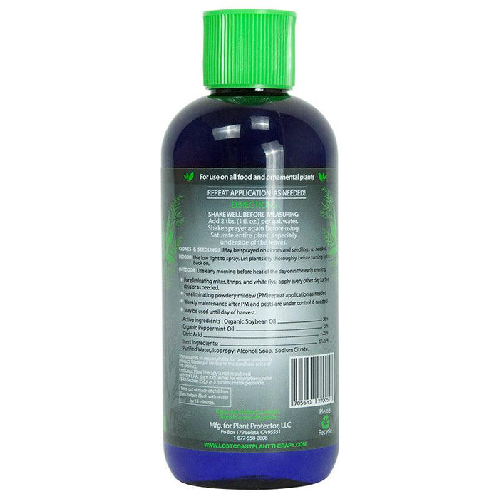 Lost Coast Plant Therapy organic pest & mildew control for food/ornamental plants. Blue bottle, green cap.