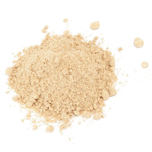 Light brown granular powder on white. Versatile cooking ingredient, spice, or supplement.