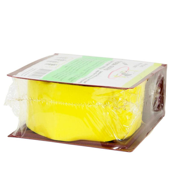 Yellow cleaning sponge in clear plastic packaging with brown base and top label.