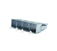 Metal 5-cell seedling tray with four white plastic plugs for garden seed starting.
