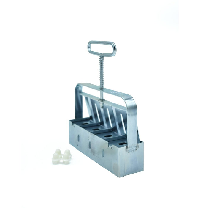 Metal soil blocker gardening tool for seed starting, creates multiple square cells. Includes white dibblers.
