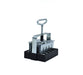 Silver metal and black plastic soil blocker for creating seedling soil blocks.