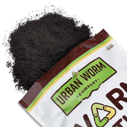 Urban Worm Company organic worm castings fertilizer spilling from bag. OMRI Listed soil amendment for plants & gardening.
