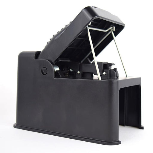 Reusable black plastic mouse trap, set open for effective rodent control.