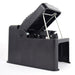 Reusable black plastic mouse trap, set open for effective rodent control.