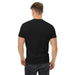 Man's back view in a black t-shirt and dark jeans. Blank tee mockup, men's casual fashion.