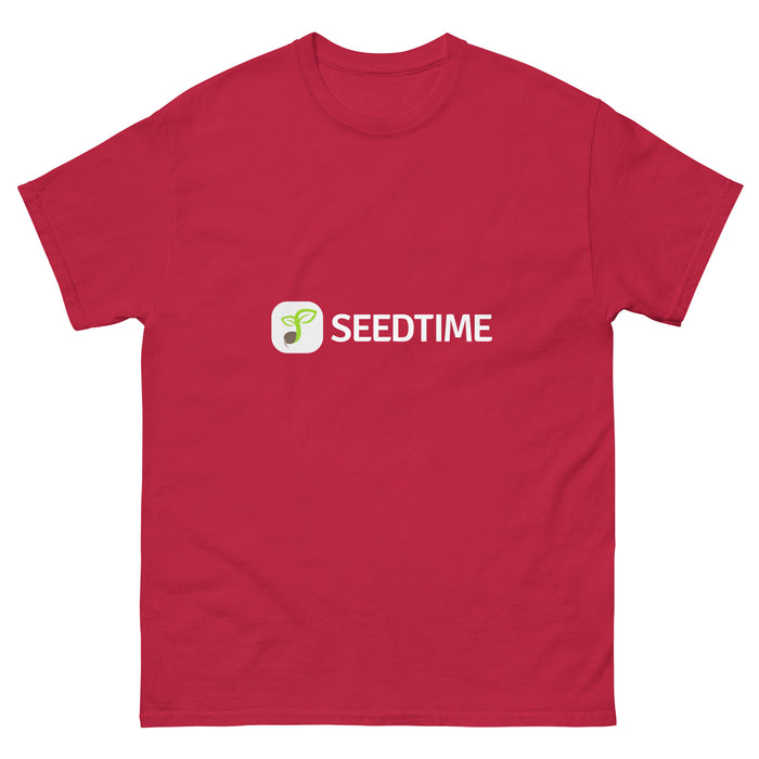 Red t-shirt with white Seedtime logo and green sprout icon. Gardening apparel for plant enthusiasts.