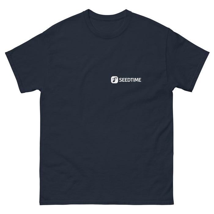 Navy blue t-shirt with white Seedtime logo and plant icon on the chest. Comfortable apparel for gardening and finance.