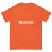 Orange Seedtime t-shirt with white logo and green plant sprout icon. Gardening apparel for plant lovers.