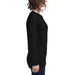 Black long-sleeve t-shirt on woman, side view. Essential women's casual top for all seasons.