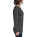 Woman wearing a plain dark gray long sleeve t-shirt, side profile. Heather gray women's casual tee.