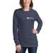 Smiling woman wearing a navy blue Seedtime long-sleeve shirt with the Seedtime logo and plant icon.