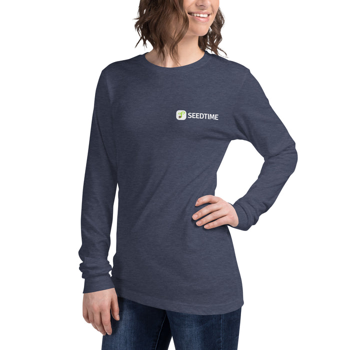Smiling woman in a navy Seedtime long sleeve t-shirt. Comfortable women's casual gardening apparel.