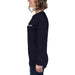 Smiling woman in navy blue long-sleeve Seedtime logo shirt. Women's casual apparel.