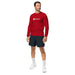 Man in red Seedtime long-sleeve shirt, dark shorts, white sneakers. Gardening clothing, men's apparel.