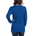 Back view of woman in royal blue long-sleeve t-shirt and dark jeans. Blank blue tee, casual women's top.