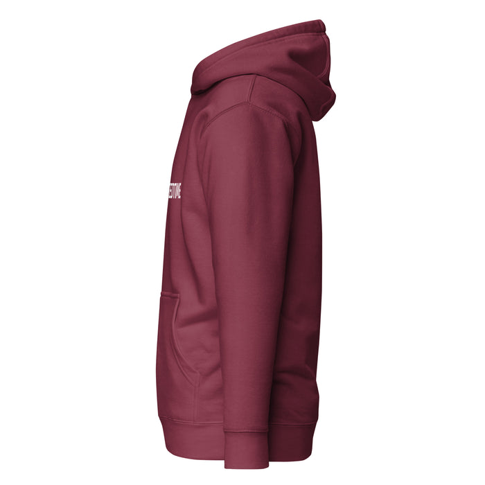 Maroon hoodie, side view. Features white text on chest, hood, front pocket, and ribbed cuffs. Cozy casual wear.