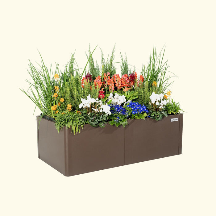Vego Garden brown rectangular planter box filled with vibrant white, blue, orange, red flowers and green plants. Modern container garden.