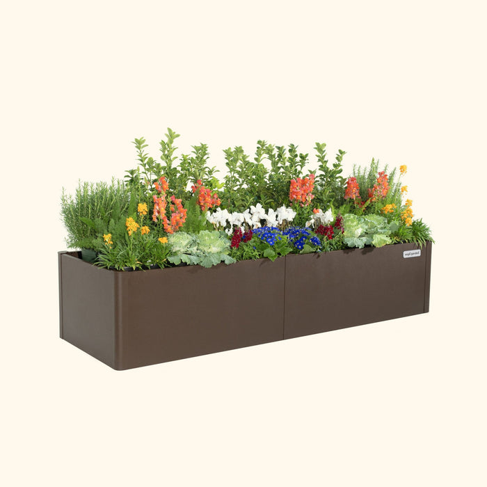 Vego Garden brown metal raised garden bed with colorful flowers, rosemary, and ornamental cabbage.