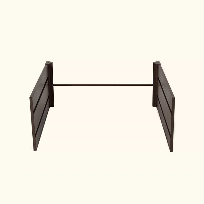 Brown slatted panel with connecting rod for modular raised garden bed or outdoor planter.