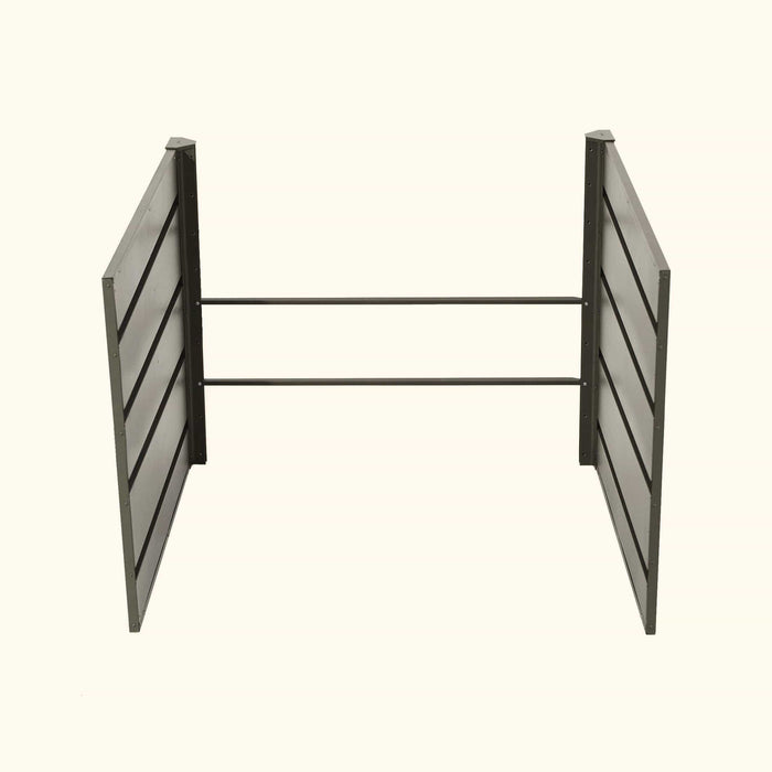 Gray metal open-frame room divider with two slatted vertical panels and horizontal support bars. Industrial partition.