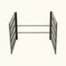 Gray metal open-frame room divider with two slatted vertical panels and horizontal support bars. Industrial partition.