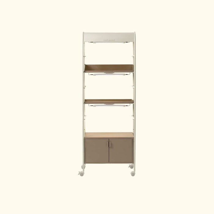 Vego Garden smart indoor garden shelf with grow lights, brown trays, storage cabinet, and wheels.