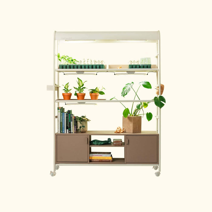 Vego Garden smart indoor grow shelf with LED lights, seedlings, houseplants. Modern plant stand with lower cabinets & wheels.