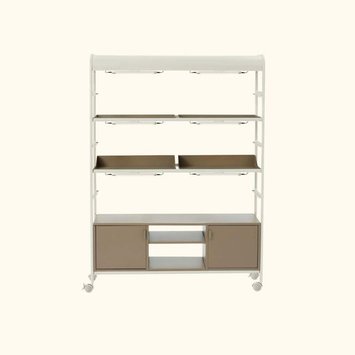 Veggö Garden indoor plant grow shelf with white frame, integrated grow lights, multiple tiers, and taupe storage cabinets on wheels.