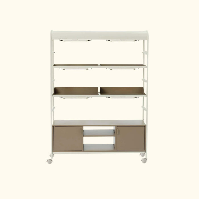 Veggö Garden indoor plant grow shelf with white frame, integrated grow lights, multiple tiers, and taupe storage cabinets on wheels.