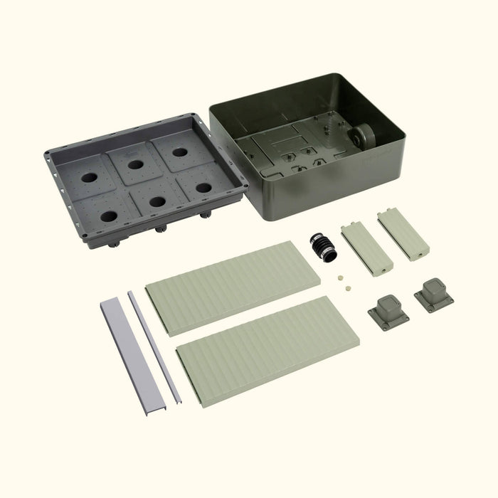 Vego Garden modular raised garden bed kit, disassembled: self-watering reservoir, planter base, side panels, and fittings.