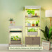 Vego Garden plant stands with LED grow lights, housing diverse houseplants, fresh herbs, and young seedlings for indoor gardening.