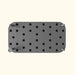 Top-down view: Modern grey modular platform with dotted grid, black circular inserts, and perforated cylindrical nozzles.