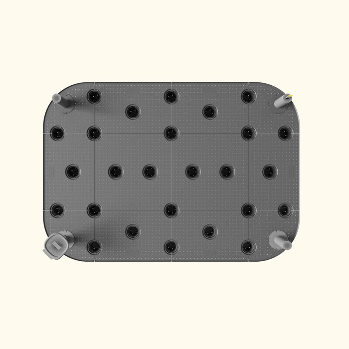 Dark grey perforated modular platform with 24 drainage holes & four corner vents.