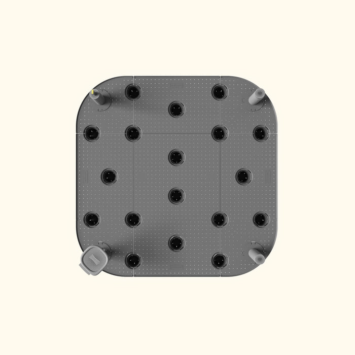 Gray modular smart panel, perforated, with black ports & corner sensors/indicators for IoT applications.