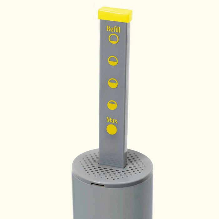 Grey and yellow refill level indicator stick with "Refill" and "Max" text, showing fill status on a perforated base.