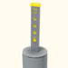 Grey and yellow refill level indicator stick with "Refill" and "Max" text, showing fill status on a perforated base.