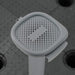 Vego Garden grey square perforated drainage screen for efficient water flow in raised garden beds and planters.