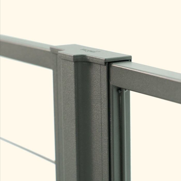 Modern anthracite metal railing system: textured post, top rail, and cable infill detail for deck or balcony.