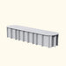 Light grey oval raised garden bed with corrugated sides and "veggie garden" text on top.