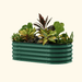 Rectangular dark green corrugated metal raised garden bed with vibrant green, yellow, and red foliage.