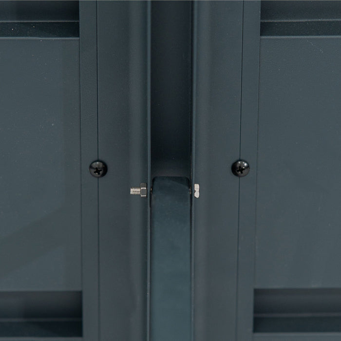 Dark gray-green panel close-up with metal bolt, nut, and screws. Detail of outdoor storage unit assembly hardware.