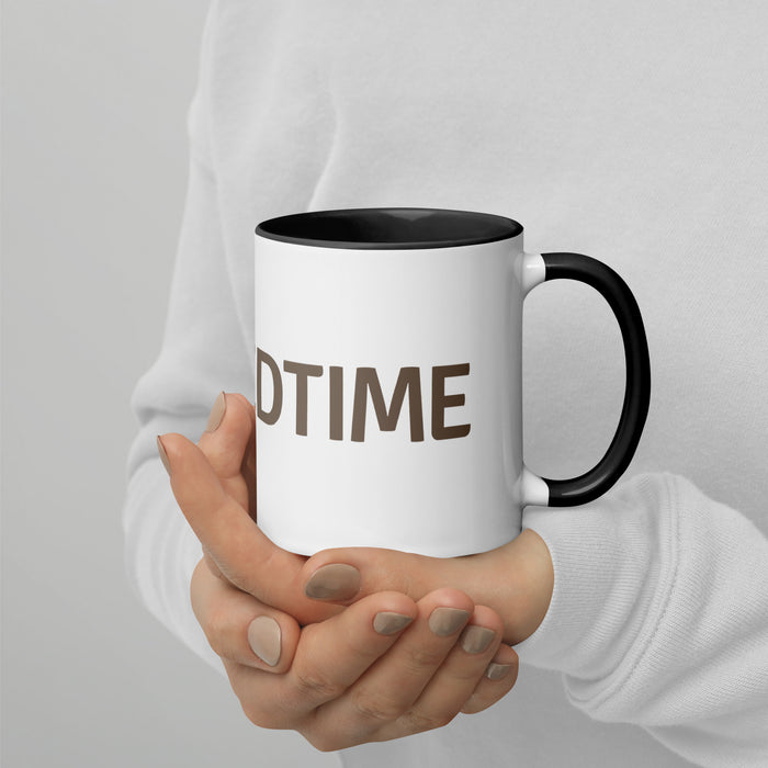 White ceramic mug with black handle and 'DTIME' text held by hands in white sweater. Personalized drinkware.