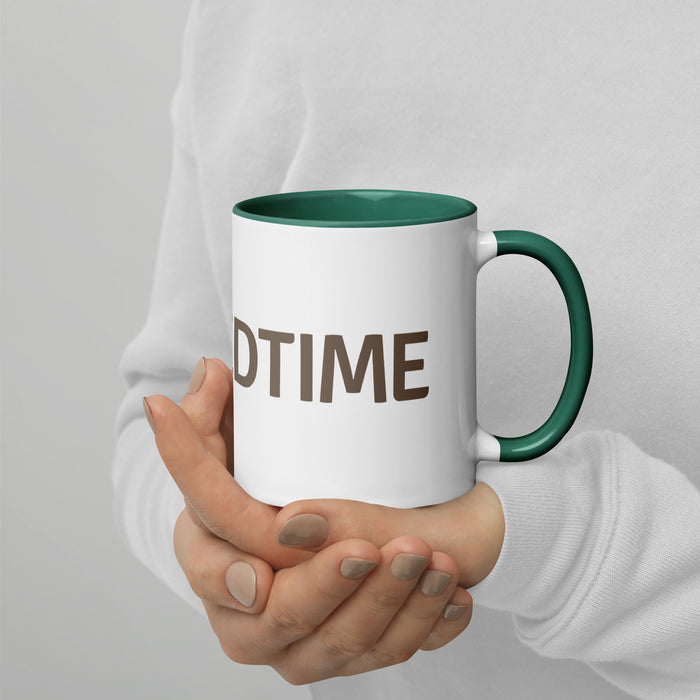 Hands hold white mug with dark green rim and handle, brown 'DTIME' text. Ideal coffee or tea cup.